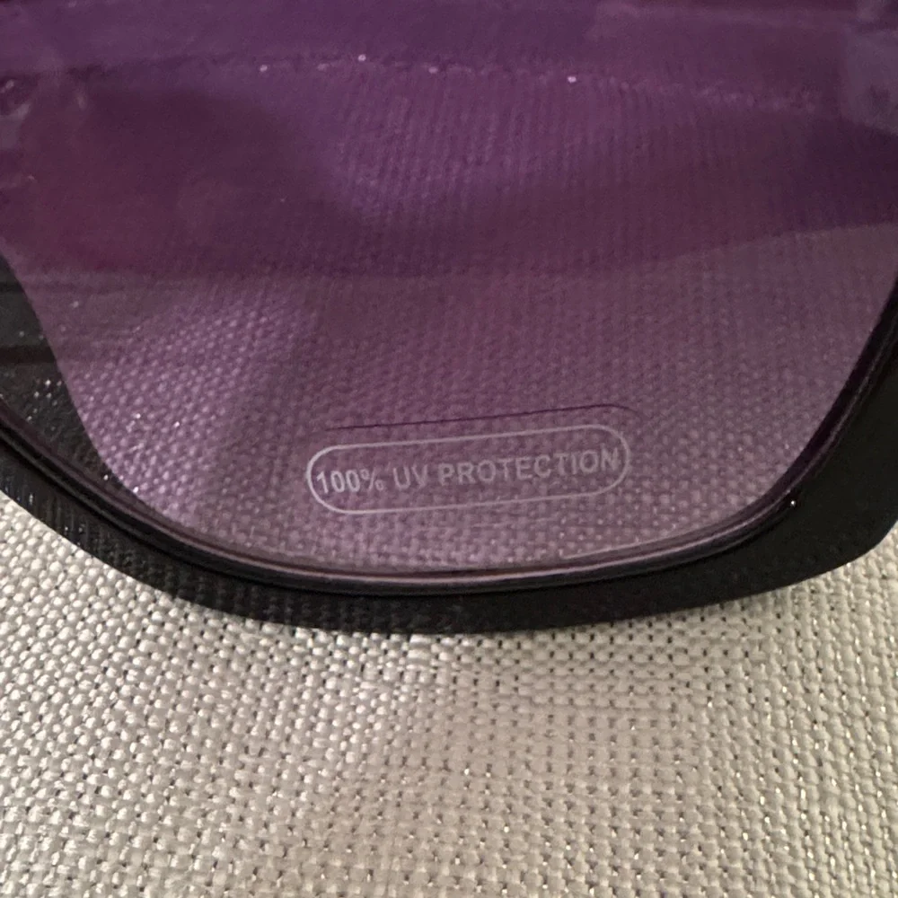 Nicole Miller Elegant Black and Gold Sunglasses